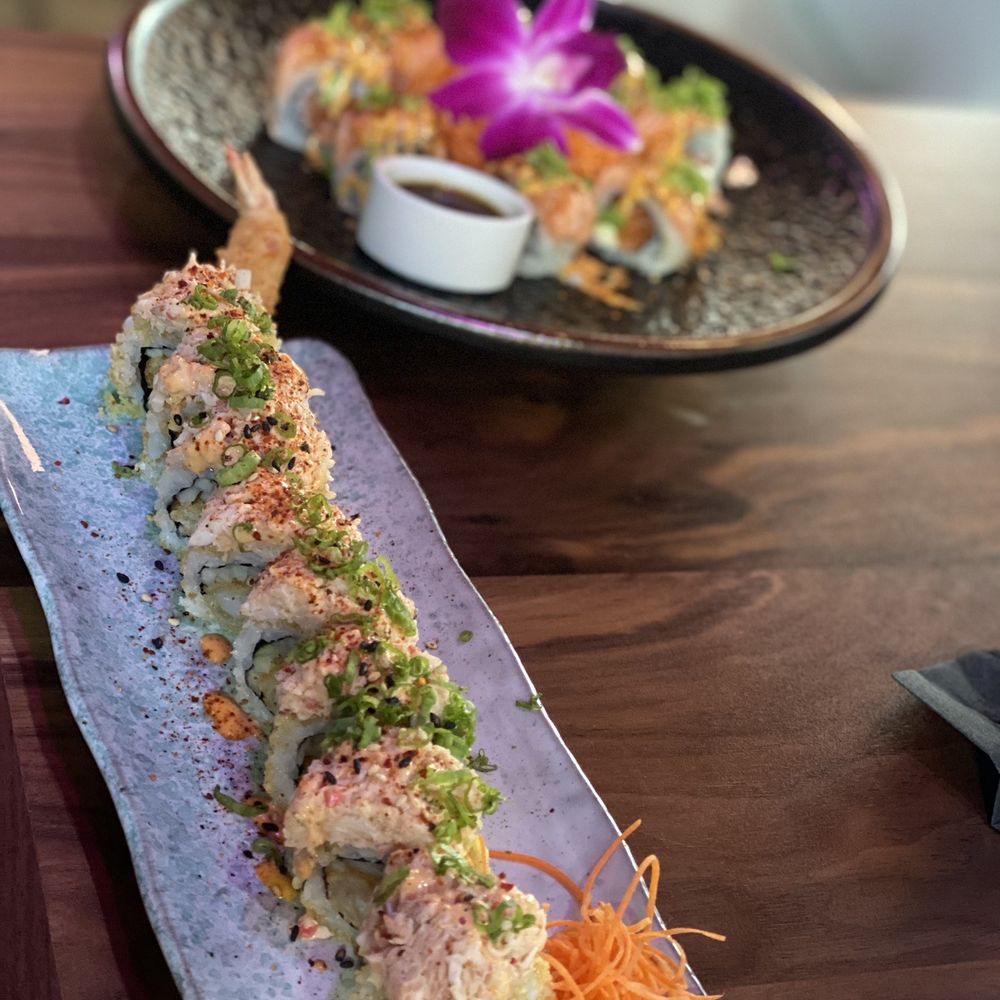 Cowa Sake - a plate of sushi and a bowl of sauce - Burgers Near Me - Hickory, North Carolina Cowa Sake - a plate of sushi and a bowl of sauce - Burgers Near Me - Hickory, North Carolina