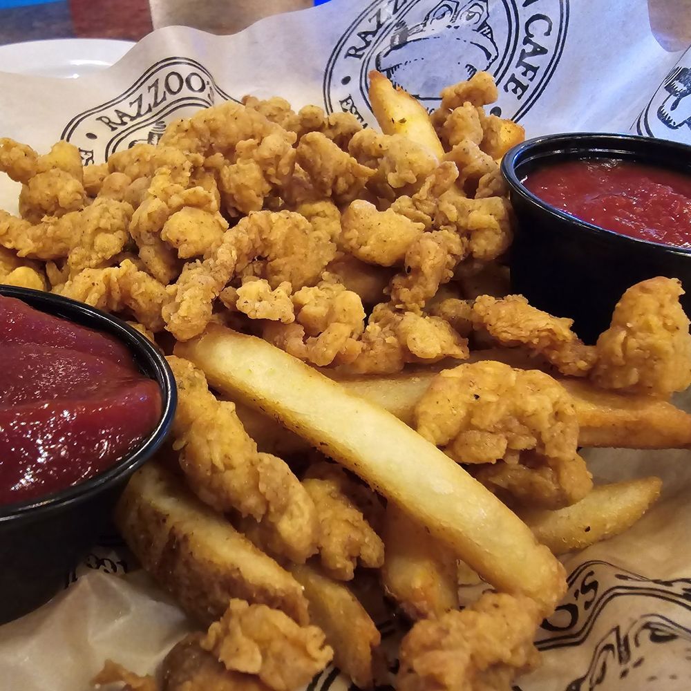 Razzoo's Cajun Cafe - CRISPY FRIED GATOR TAIL: Gator tail fried crispy, seasoned fries and cocktail sauce. - Cajun/Creole Near Me - Irving, Texas Razzoo's Cajun Cafe - CRISPY FRIED GATOR TAIL: Gator tail fried crispy, seasoned fries and cocktail sauce. - Cajun/Creole Near Me - Irving, Texas