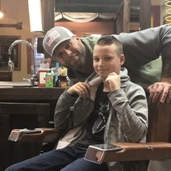Lakeside Barber and Shave Parlor - Owner/Barber Jason with another satisfied customer!