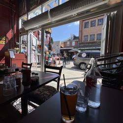 Outdoor seating and they open the windows on a nice day!