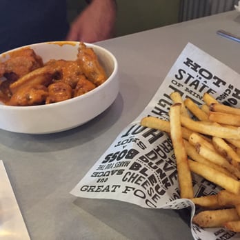Wings and Rings - Garlic wings. Frozen flash-fried fries. - Chicken Wings Near Me - Cincinnati, Ohio Wings and Rings - Garlic wings. Frozen flash-fried fries. - Chicken Wings Near Me - Cincinnati, Ohio