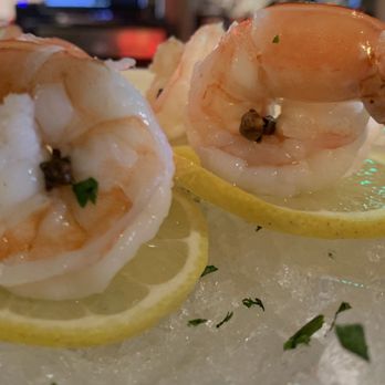 RipTides Cocktails and Grill - Jumbo shrimp cocktail With a small amount of clove And of course with some lemon! So good! - American Near Me - Lindenhurst, New York