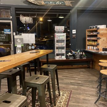 Pilot House Distilling - a bar with stools - Distilleries Near Me - Astoria, Oregon