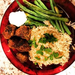 The Gypsy Kitchen - Mediterranean meatballs with saffron rice, tzatziki sauce, and roasted green beans.