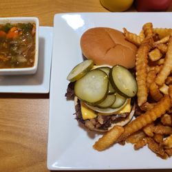 Huddle Cafe - Bacon cheeseburger with fries ordered extra crisp and a vegetable beef soup.