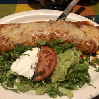 Pancho's Authentic Mexican Restaurant - Huge steak burrito covered with tomato based sauce - Mexican Near Me - Troy, New York Pancho's Authentic Mexican Restaurant - Huge steak burrito covered with tomato based sauce - Mexican Near Me - Troy, New York