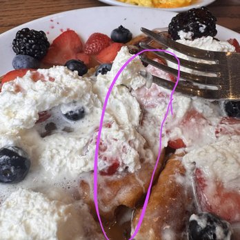 Another Broken Egg Cafe - This was the Cinnamon Roll French Toast which clearly has hair in it. - Breakfast & Brunch Near Me - Pensacola, Florida