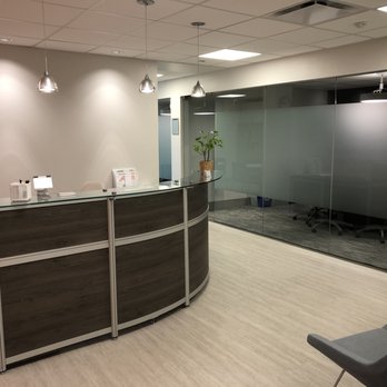 Office Evolution - Westport - Reception area, receptionist to greet your clients and accept packages. - Shared Office Spaces Near Me - Westport, Connecticut Office Evolution - Westport - Reception area, receptionist to greet your clients and accept packages. - Shared Office Spaces Near Me - Westport, Connecticut