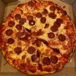 a pepperoni pizza in a box
