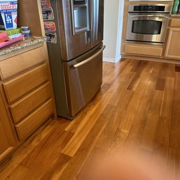 a stainless steel refrigerator in a kitchen a stainless steel refrigerator in a kitchen
