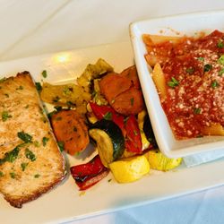 Asti's Italian Steakhouse - Maple-bourbon salmon with vegetables and pasta