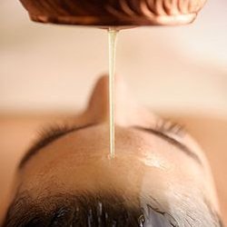 Experience bliss with a Shirodhara that deeply calms your nervous system and opens up your 3rd eye.