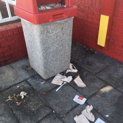 Trash overflowing in the play area outside