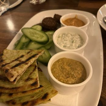 Eastend - Mediterranean plate w/pita, Persian cucumbers, Kalamata olives, hummus, and 2 other dips - New American Near Me - Greenwich, Connecticut Eastend - Mediterranean plate w/pita, Persian cucumbers, Kalamata olives, hummus, and 2 other dips - New American Near Me - Greenwich, Connecticut