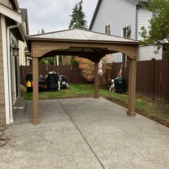 Premier Solutions NW - Costco gazebo build 12'x14' with custom gutter and new concrete patio. 1095 pieces total. - Handyman Near Me