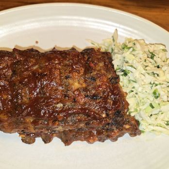 The Macintosh - Cowboy rack of baby back ribs with tahini slaw. - New American Near Me - Phoenix, Arizona