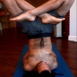 Taireiki: Yoga and Wellness Center - Shoulder Stand in Lotus (Front)