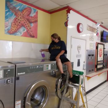 Super Wash N Dry - Leonora cleaning the tops of washers. - Laundromat Near Me - Downey, California Super Wash N Dry - Leonora cleaning the tops of washers. - Laundromat Near Me - Downey, California