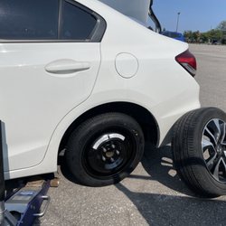 Friendly Roadside Guy - Spare tire inflated and installed