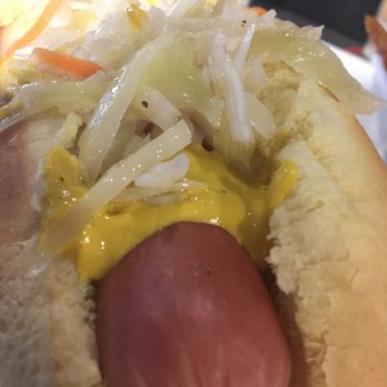 Urban Crave - Close Up of the Montreal Dog=mustard, onions, and coleslaw atop a beef frank! - Sandwiches Near Me - Dorval, Quebec Urban Crave - Close Up of the Montreal Dog=mustard, onions, and coleslaw atop a beef frank! - Sandwiches Near Me - Dorval, Quebec