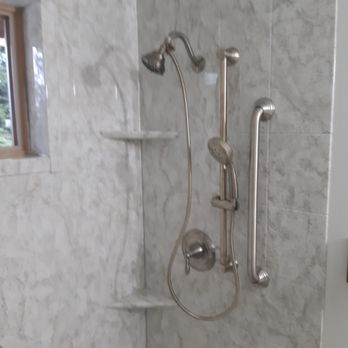 Ace Works - New walk in shower conversion with window, shelves, seat, grab bars, slide bar with hand held in brushed nickle. - Plumbing Near Me