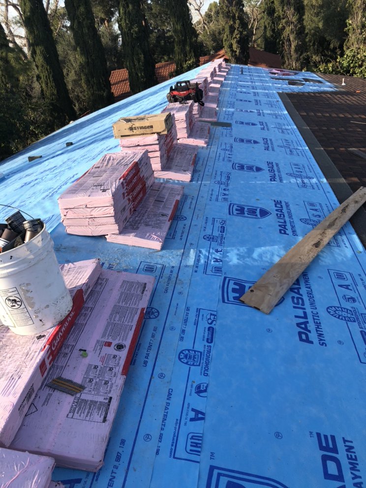 Slide of Atlas Roofing Company