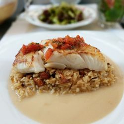 Dachsbau - Cod on top of in season fresh chanterelle mushroom risotto