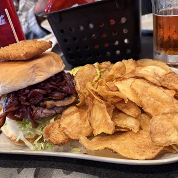 Monk's Bar & Grill - Alamo burger sans the BBQ sauce and one wedge already eaten. Included Monk potato chippers - American Near Me - Sun Prairie, Wisconsin Monk's Bar & Grill - Alamo burger sans the BBQ sauce and one wedge already eaten. Included Monk potato chippers - American Near Me - Sun Prairie, Wisconsin