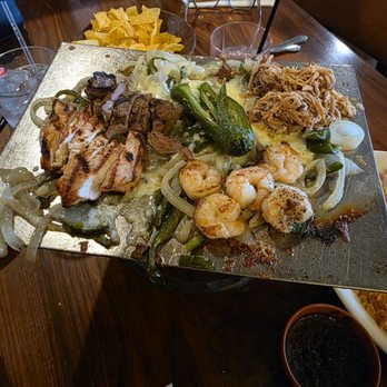 Cristina’s Fine Mexican Restaurant - La Gran Parrillada de Guadalajara Chicken,Beef, Sautéed Shrimp, and Carnitas. - Mexican Near Me - Keller, Texas Cristina’s Fine Mexican Restaurant - La Gran Parrillada de Guadalajara Chicken,Beef, Sautéed Shrimp, and Carnitas. - Mexican Near Me - Keller, Texas