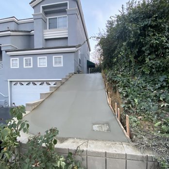 Torres Concrete - Gradual V ditch in the middle and leading to the drain - Masonry/Concrete Near Me Torres Concrete - Gradual V ditch in the middle and leading to the drain - Masonry/Concrete Near Me