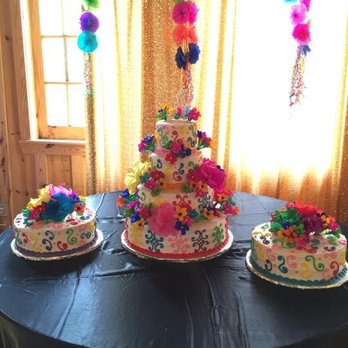 Doria's Cakes - three tiered cakes on a table - Bakeries Near Me - Martindale, Texas Doria's Cakes - three tiered cakes on a table - Bakeries Near Me - Martindale, Texas