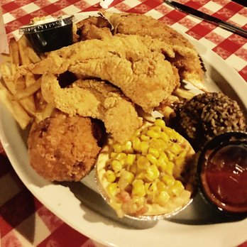 Prejean's - Seafood platter. Catfish, oysters, crawfish, shrimp, crab, frog legs, alligator tails, corn maque choux, rice pudding, crawfish Bourdin. - Cajun/Creole Near Me - Lafayette, Louisiana Prejean's - Seafood platter. Catfish, oysters, crawfish, shrimp, crab, frog legs, alligator tails, corn maque choux, rice pudding, crawfish Bourdin. - Cajun/Creole Near Me - Lafayette, Louisiana