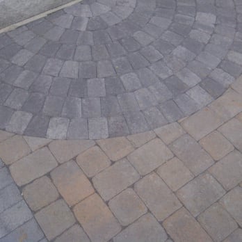 Advanced Lawn Care - a circular pattern of bricks - Landscaping Near Me Advanced Lawn Care - a circular pattern of bricks - Landscaping Near Me
