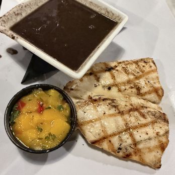 Blue Dog Bar & Grill - Grilled Mahi with mango salsa & black beans - Bars Near Me - Matlacha, Florida
