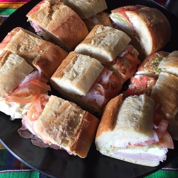 Giovannis Deli - Assorted sandwiches-- Italian sub, ham and mozzarella sub, mozzarella and roasted red pepper sub, and turkey and mozzarella sub. - Delis Near Me - Secaucus, New Jersey Giovannis Deli - Assorted sandwiches-- Italian sub, ham and mozzarella sub, mozzarella and roasted red pepper sub, and turkey and mozzarella sub. - Delis Near Me - Secaucus, New Jersey