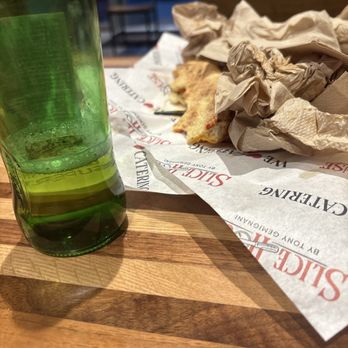 Slice House - Peroni and crust - I never leave the crust!!!  But about 1/3 of the slice is going to the trash. - Pizza Near Me - Mountain View, California