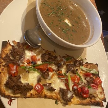 Seasons 52 - Philly Cheesesteak flatbread with Mushroom Bisque - Seafood Near Me - Buford, Georgia