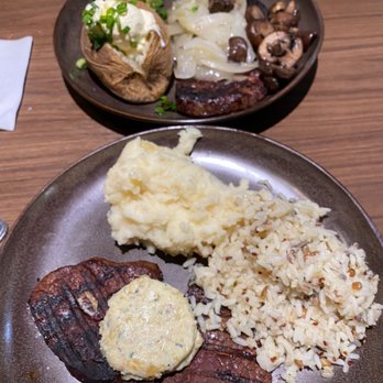 Black Angus Steakhouse - Filet Mignon with Mashed Potatoes and Rice Pilaf for me. Filet Mignon with baked potato and broccoli for my boyfriend. - Steakhouses Near Me - Lancaster, California Black Angus Steakhouse - Filet Mignon with Mashed Potatoes and Rice Pilaf for me. Filet Mignon with baked potato and broccoli for my boyfriend. - Steakhouses Near Me - Lancaster, California
