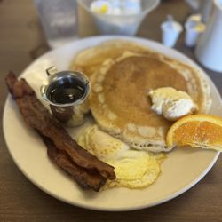 Train Station Coffee Shop - Two pancake two bacon, one egg plate.