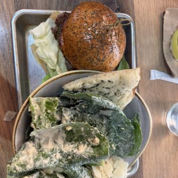 Moku Kitchen - Hamburger with Cesar salad - Cocktail Bars Near Me - Honolulu, Hawaii