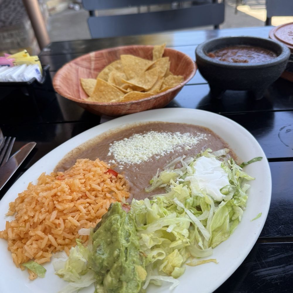 El Sinaloense - accompaniment plate small relative to the huge molcajete but delicious - Seafood Near Me - San Mateo, California