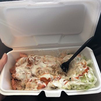 Gyro 2 Go - Chicken. Seemed like a LOT of sauce. (I mixed it up just a bit before thinking of taking a pic) - Halal Near Me - Sacramento, California