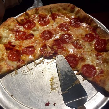 Julliano's Brick Oven Pizza - 12" pizza, less two slices. - Pizza Near Me - Gaithersburg, Maryland Julliano's Brick Oven Pizza - 12" pizza, less two slices. - Pizza Near Me - Gaithersburg, Maryland