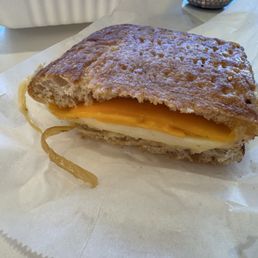 My half of a breakfast sandwich. My half of a breakfast sandwich.