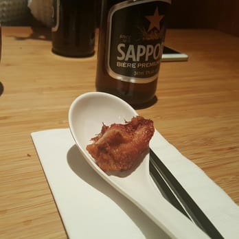Sansotei Ramen - Delicious Hot Fried Chicken resting on a spoon! - Ramen Near Me - Toronto, Ontario Sansotei Ramen - Delicious Hot Fried Chicken resting on a spoon! - Ramen Near Me - Toronto, Ontario