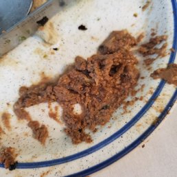 Photo of Sammy's Roumanian Steakhouse - New York, NY, United States. Chopped chicken liver or gummy brown stuff, gooey fried onions, white, limp, stringy  radishes