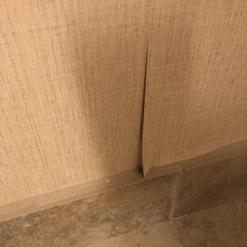 Best Western Plus Island Palms Hotel & Marina - Wall paper peeling off several walls. - San Diego, CA