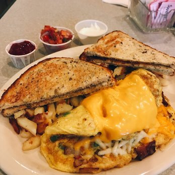 Moon's Kitchen Cafe - The monster omelette! It comes with 5 eggs! But I asked for 3 instead. I wouldn't have been able to eat a 5 egg omelette. - Breakfast & Brunch Near Me - Boise, Idaho Moon's Kitchen Cafe - The monster omelette! It comes with 5 eggs! But I asked for 3 instead. I wouldn't have been able to eat a 5 egg omelette. - Breakfast & Brunch Near Me - Boise, Idaho