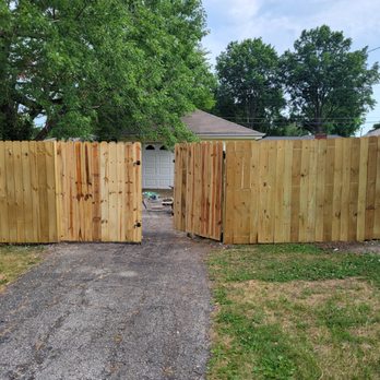 Yard Inspirations - a wooden fence with a bench in front of it - Fences & Gates Near Me Yard Inspirations - a wooden fence with a bench in front of it - Fences & Gates Near Me