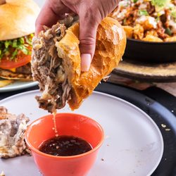 Mama's On 39 - French Dip, Mama's Style! Thinly sliced prime rib, caramelized onions, swiss cheese, thick french bread roll